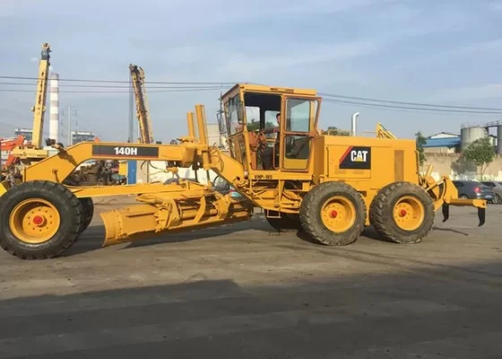 Niveleuse Cat 140H d'occasion